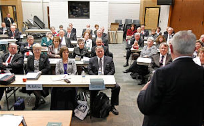 Couples listen in a class for senior missionaries.