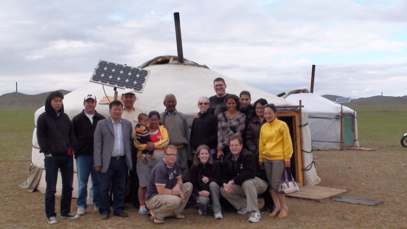 Dr. Raymond Price, bottom right, poses with the laparoscopic surgery training team in Uvurkhangai, Mongolia, in 2011.
