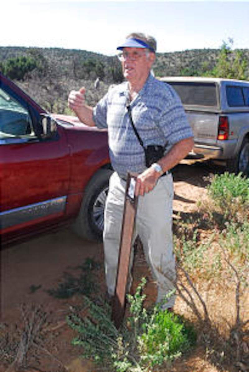 Author and historian Hartt Wixom notes a marker he helped place to identify the Honeymoon Trail.