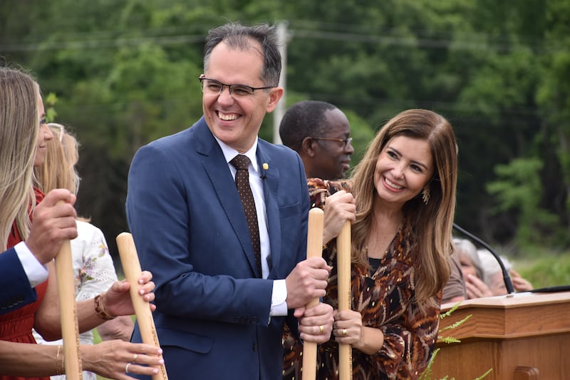 Elder Aroldo B. Cavalcante, a General Authority Seventy and counselor in the United States Southeast Area Presidency, and his wife, Sister Christiana Cavalcante, join others at the groundbreaking ceremony for the Springfield Missouri Temple.