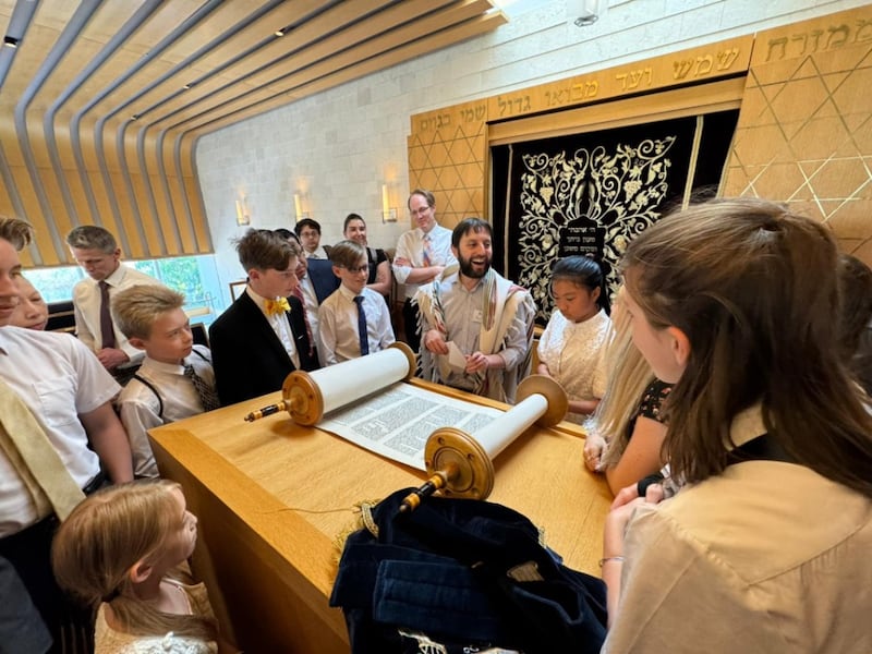 Rabbi Andrew Scheer teaches members of The Church of Jesus Christ of Latter-day Saints about the Torah during a visit to the Jewish Community of Japan Synagogue, Hiroo District, Japan, May 17, 2026.