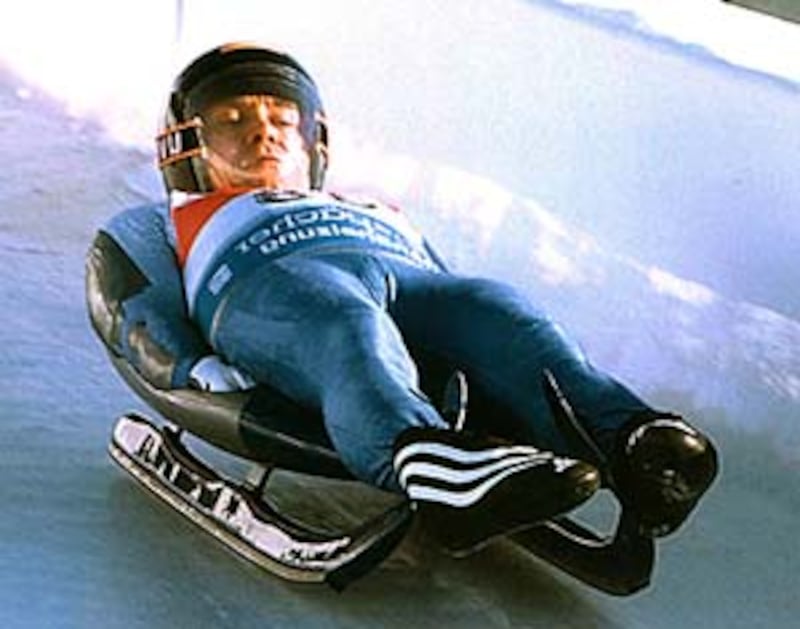 Werner Hoeger slides in Canada.