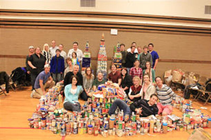 The Willow Creek YSA Ward pose with their winning sculpture.