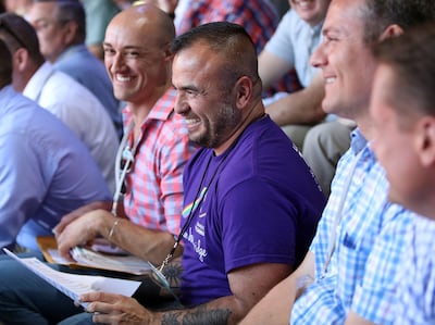Thao Hill, a member of the San Francisco Gay Men’s Chorus, laughs during soundcheck with the Mormon Tabernacle Choir at the Shoreline Amphitheatre in Mountain View, Calif., on Monday, June 25, 2018.