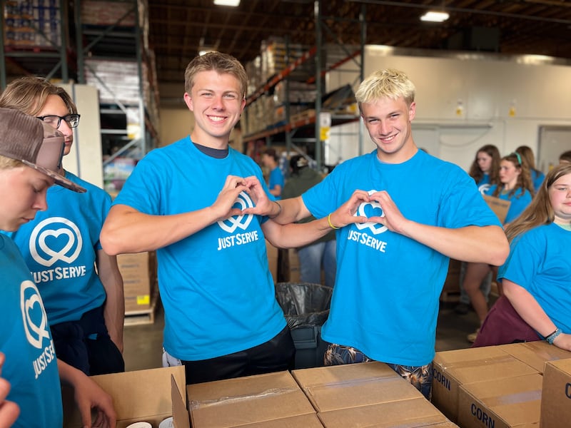 JustServe volunteers pose for a photo while unloading and preparing food donations from The Church of Jesus Christ of Latter-day Saints in Fairbanks, Alaska, on June 11, 2026, for distribution to nonprofits and those in need.