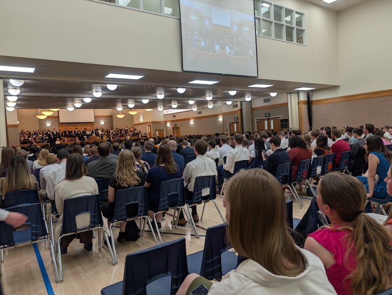 Young adults gather in an overflow area while listening to Elder Dale G. Renlund of the Quorum of the Twelve Apostles and his wife, Sister Ruth L. Renlund, at a devotional at the Jordan Institute of Religion in West Jordan, Utah, on Sunday, April 19, 2026.