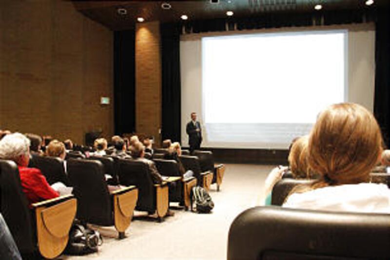 Audience members at the 49th Annual Virginia F. Cutler Lecture at BYU listen as Larry Nelson, a prof