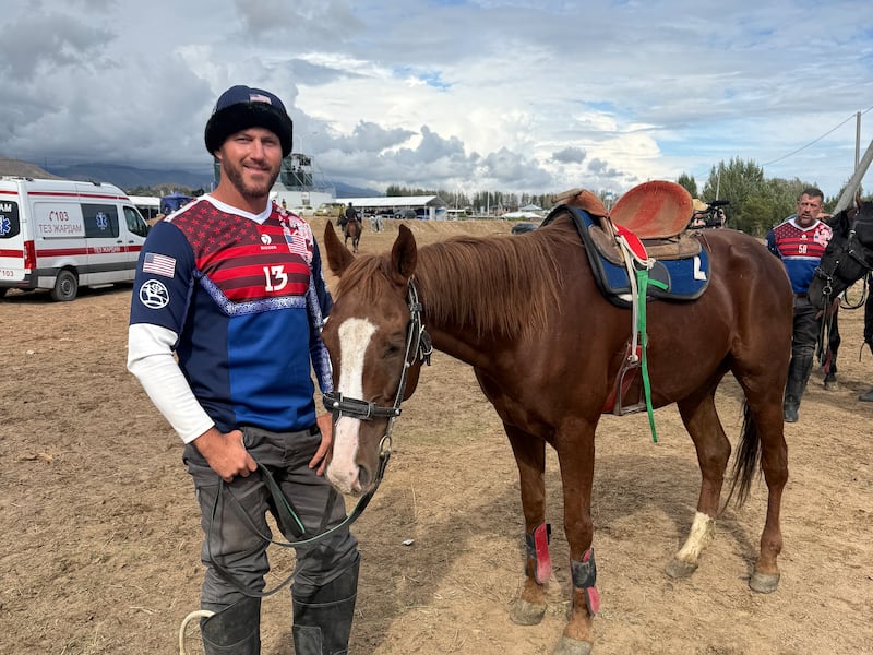 Brian Ewell, a member of the U.S. Kok-Boru team and a Latter-day Saint returned missionary, stands with his horse at the sixth World Nomad Games, held Aug. 31 to Sept. 6, 2026, in Bishkek and Cholpon-Ata, Kyrgyzstan.