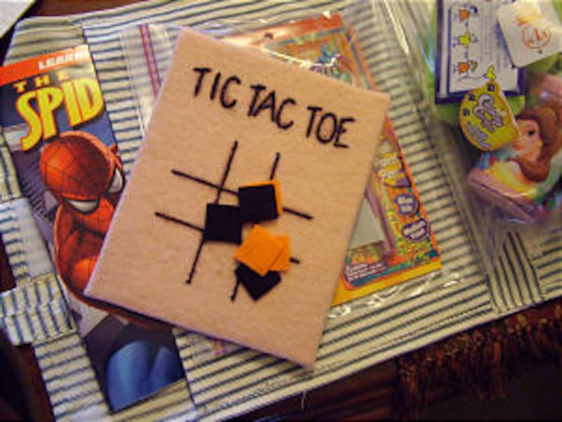 Travel bags have games for children to play with as they travel.