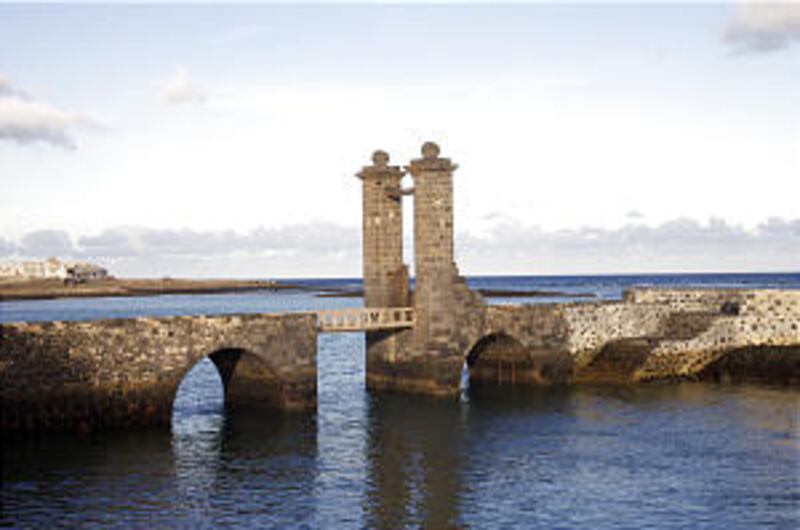 Harbor is one of the picturesque scenes on northernmost Canary Island that draws thousands of touris