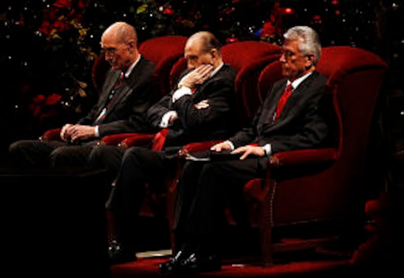 Members of the first Presidency President Henry B. Eyring, left, President Thomas S. Monson, center,