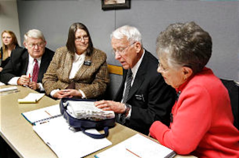 At the MTC, Neil and Arlea Carmack, Centerville, Utah, left; and Sterling and Margaret Ottesen, Mapl