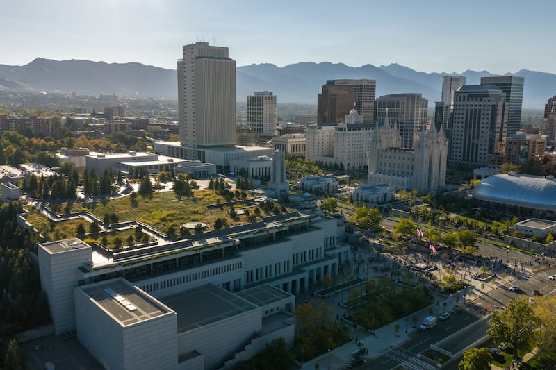 The Conference Center, left is seen across the street from the Salt Lake Temple and Temple Square in Salt Lake City on Sunday morning, Oct. 4, 2026.