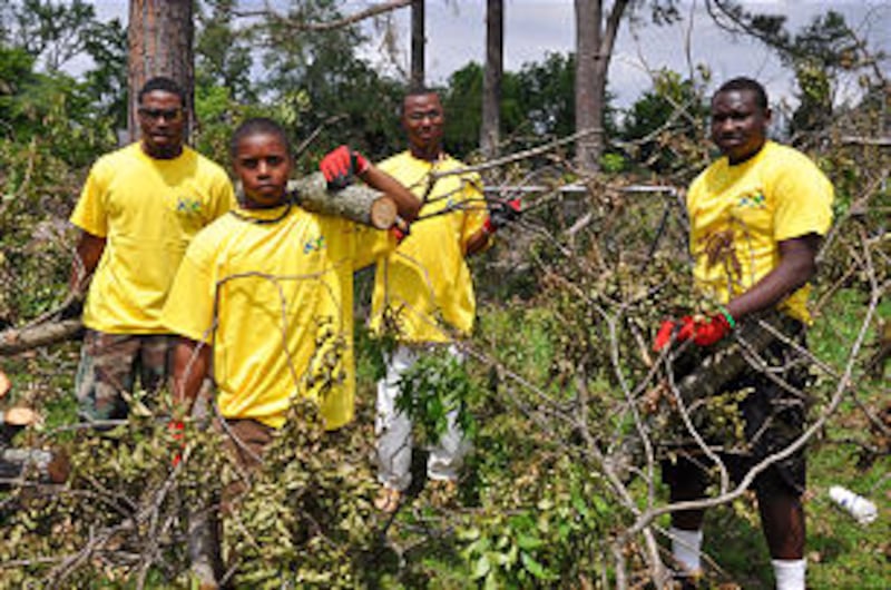 Priests from the Ensley Branch, Bessemer Alabama Stake, donned yellow Mormon Helping Hands T-shirts