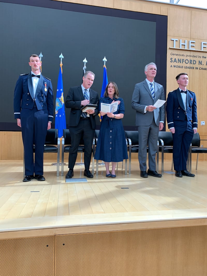Those on the stand sing the opening hymn before the baccalaureate service in Polaris Hall at the USAFA campus in Colorado Springs, Colorado, Sunday, May 24, 2026.