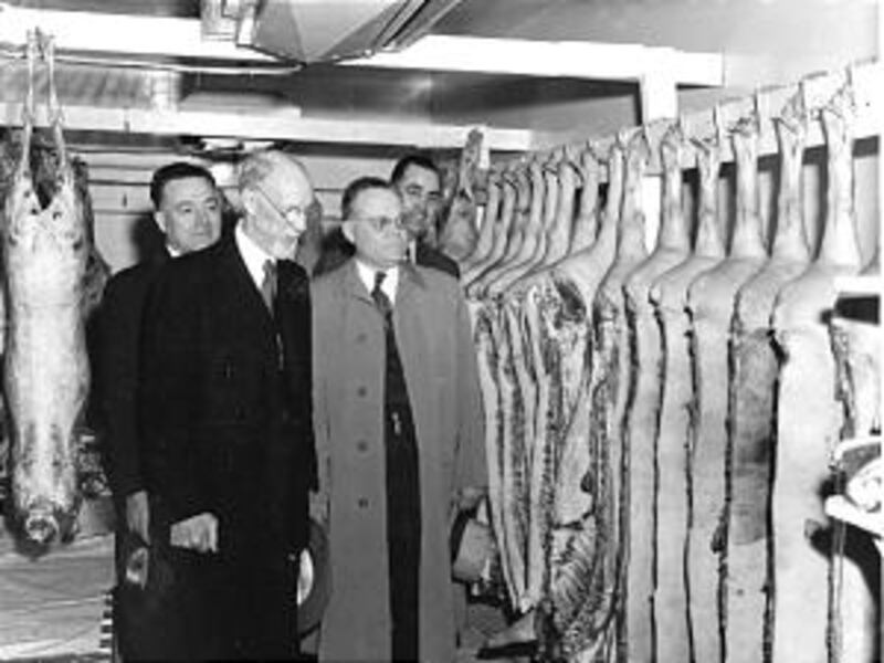President George Albert Smith, accompanied by Elders Harold B. Lee and Marion G. Romney and Stewart