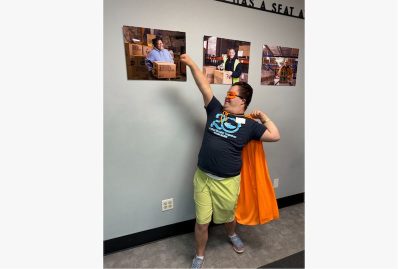 Elder Welch poses with his cape at the Facing Hunger Foodbank in Huntington, West Virginia. Elder Welch began his missionary service in June 2024 and will conclude in June 2026.