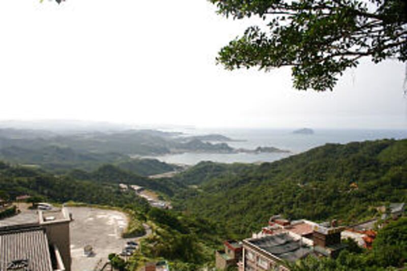 The north coast of Taiwan is surrounded by green-covered mountainous terrain typical of the spectacu