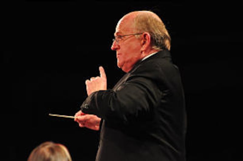 Mack Wilberg, music director of the Mormon Tabernacle Choir, conducts performance of the choir and O