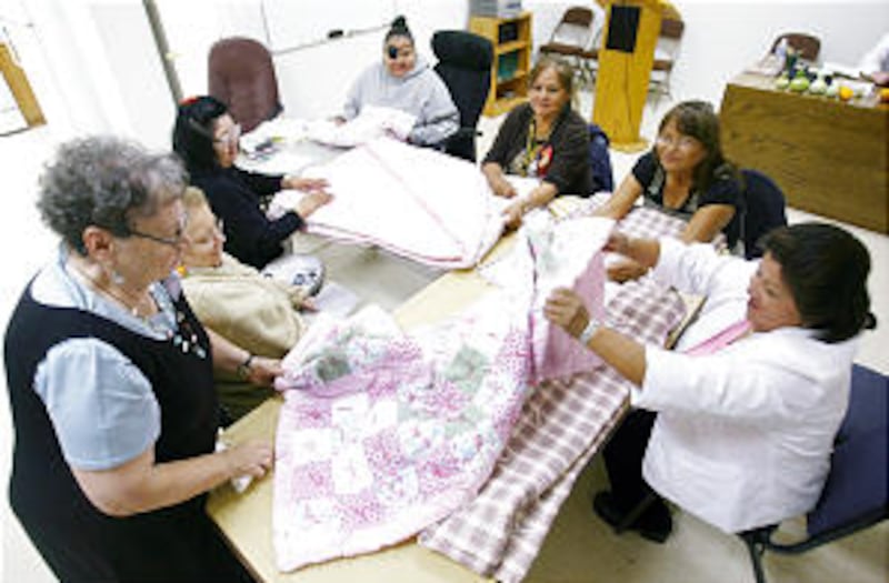 LDS missionary Patricia Jasper (L) holds Relief Society on the the Havasupai Indian reservation Oct
