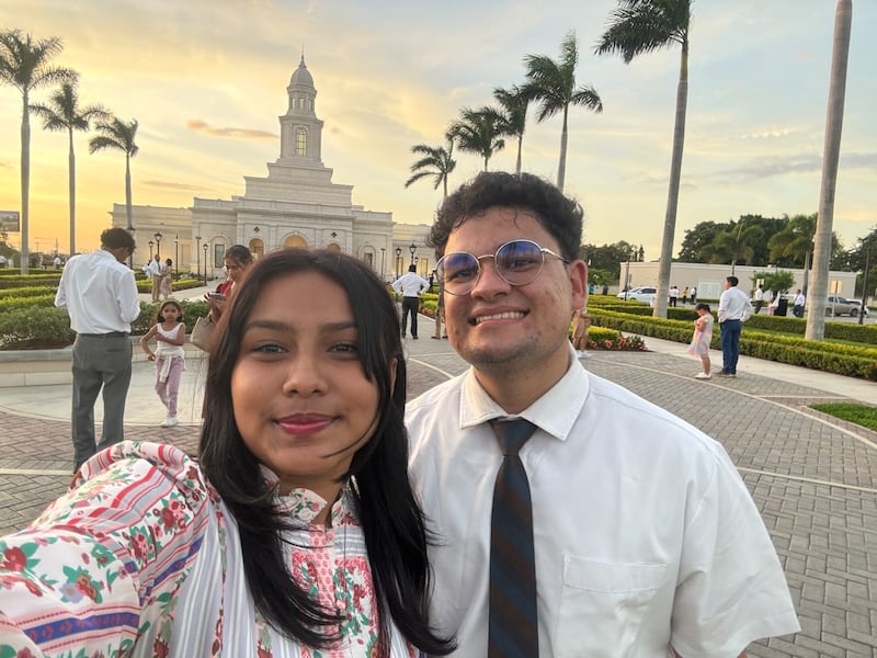 Ashly Solange García Araica and her boyfriend, Rubén Salazar Peña, both returned missionaries, take a picture together outside the Managua Nicaragua Temple in Managua, Nicaragua during the open house in September 2026.
