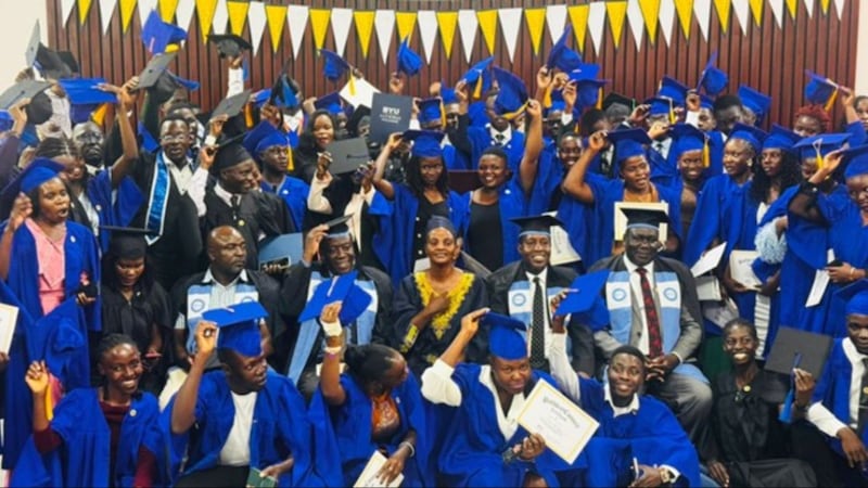 Government officials, graduates, and Church Education leaders pose for a group photo after the commencement ceremony in Jinja, Uganda April 17, 2026.