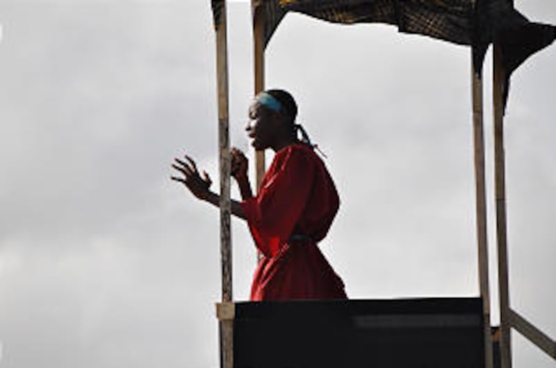 A young man from Accra, Ghana, gives an address as he plays King Benjamin from the Book of Mormon.