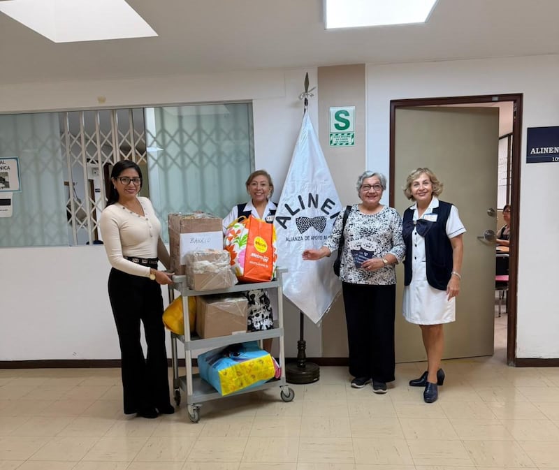 Relief Society members in the Lima Peru La Victoria State of The Church of Jesus Christ of Latter-day Saints donate homemade clothing for cancer patients at the National Institute of Neoplastic Diseases in Lima, Peru, in June 2026.