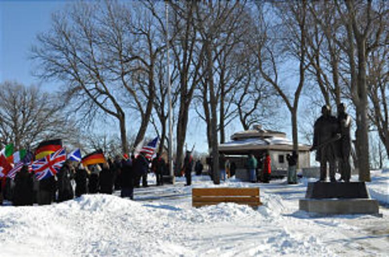 Attendees observe exodus on bank of Mississippi River, where exiled Nauvoo Saints crossed over to Io