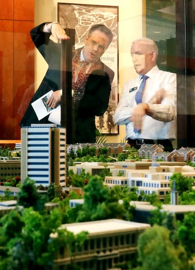 Matthew O. Richardson, Advancement Vice President, and Jim Kasen, Director of University relations talk about the highly-detailed campus diorama as BYU unveils it in Provo on Tuesday, July 2, 2019.