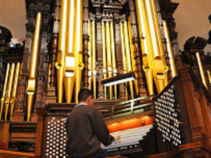 While visiting Utah in April, Kuha'o Kawaauhau-Case plays the organ in the Tabernacle on Temple Squa