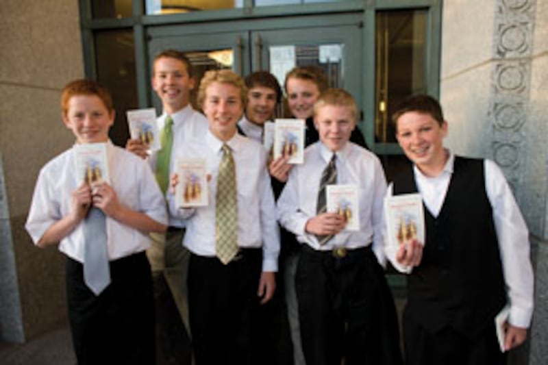 Thousands of youth, including these young men, assembled in Conference Center for taping.