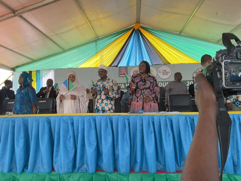 From left to right: Susan Ngugi Namondo, Zawadi Nassor, Martin Shigella and Dorothy Gwajima all stand to greet the crowd gathered for the International Women's Day celebration on March 8, 2026 in Geita, Tanzania.