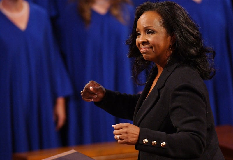 Gladys Knight leads the Saints Unified Voices choir during a worship service in the Tabernacle entit