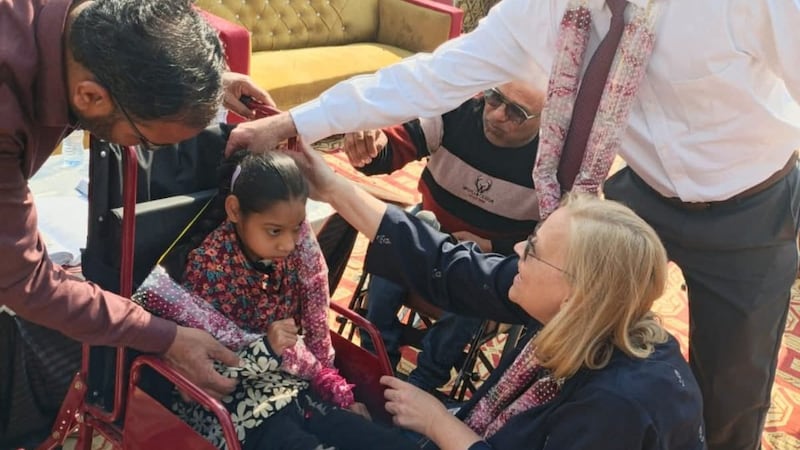 Members of The Church of Jesus Christ of Latter-day Saints work with representatives from the Society for Special Persons in Punjab, Pakistan, to provide customized wheelchairs for people with disabilities in February 2026.