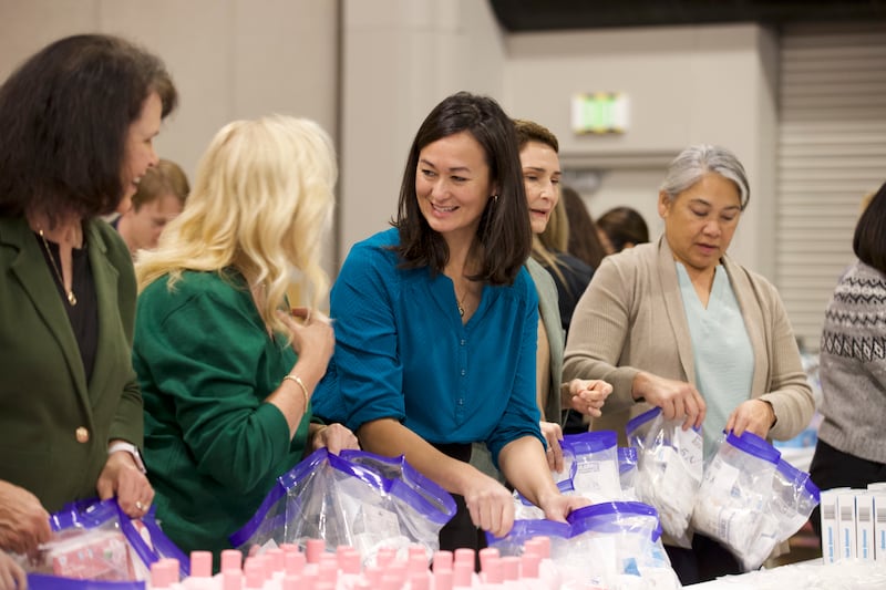 Sister Sister Kristin M. Yee, second counselor in the Relief Society general presidency, joins in making hygiene kits for babies for a JustServe project at the National League of Cities summit in Salt Lake City, Utah, on Thursday, Nov. 20, 2025.