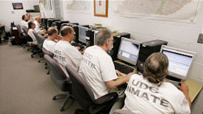 Inmates work on family history.