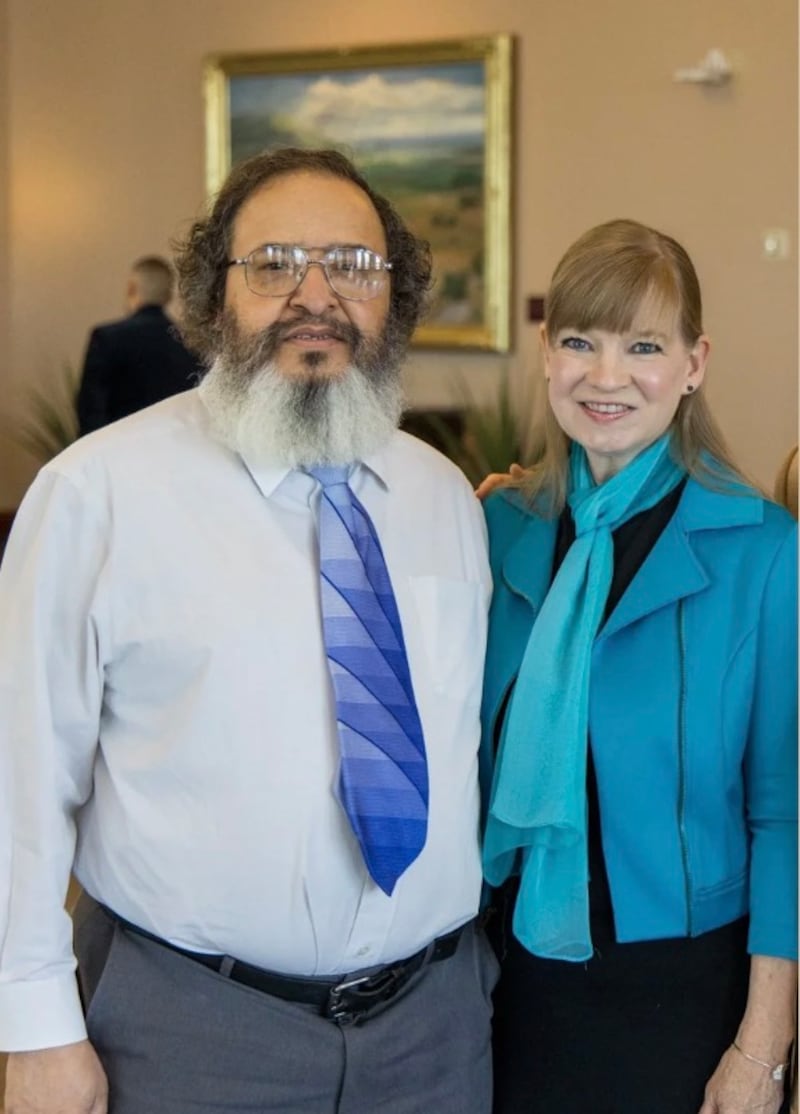 Demetrius O’Neal, left, and Andrea Brett, right, smile for a photo during the April 2025 general conference in Salt Lake City on April 6, 2025.