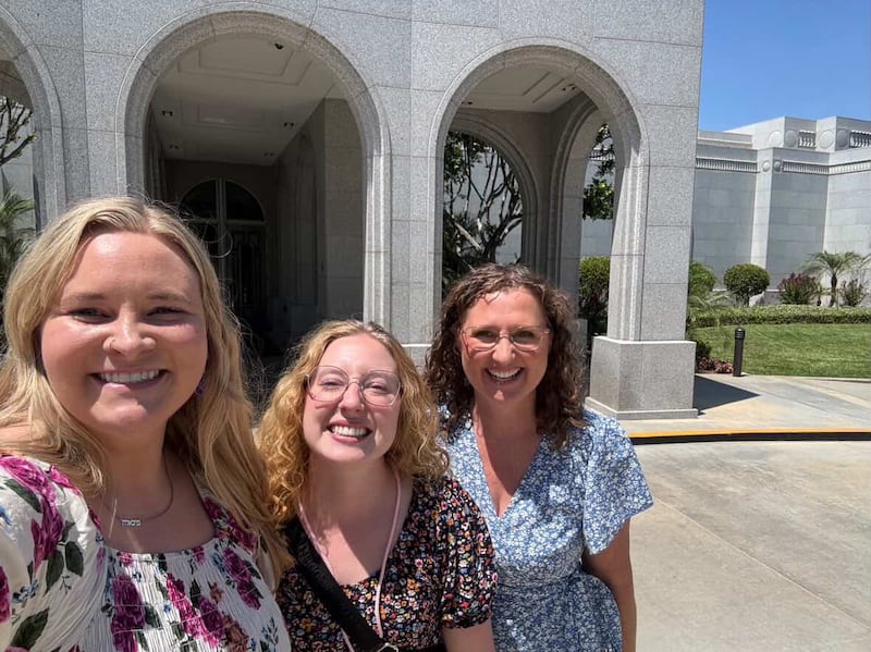 Young single adults smile for a photo outside the Redlands California Temple during the 2025 ASL YSA conference. The conference took place from Aug. 14 to 18, 2025.