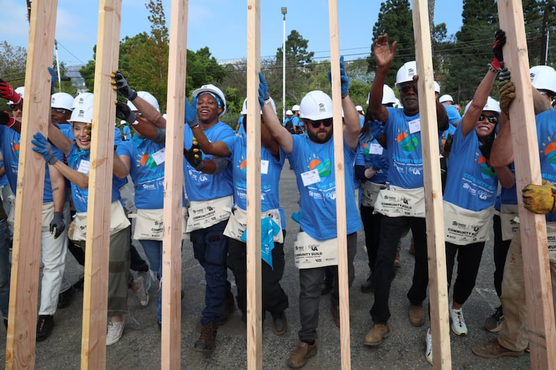 Volunteers at a Habitat for Humanity event work to rebuild homes destroyed during the Palisades Fire during a four day event in September 2026 in Los Angeles, California.