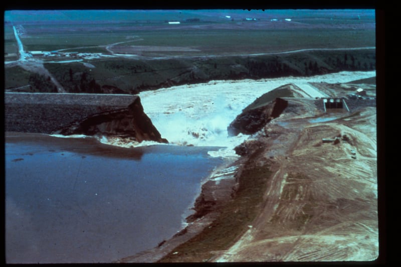 Water pours from a rupture in the Teton Dam on Saturday, June 5, 1976.