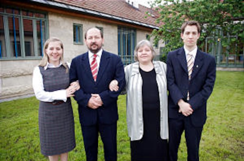 Outgoing district President Sandor Juhasz, his wife, Juliannea, and children Rebeka and Daniel.