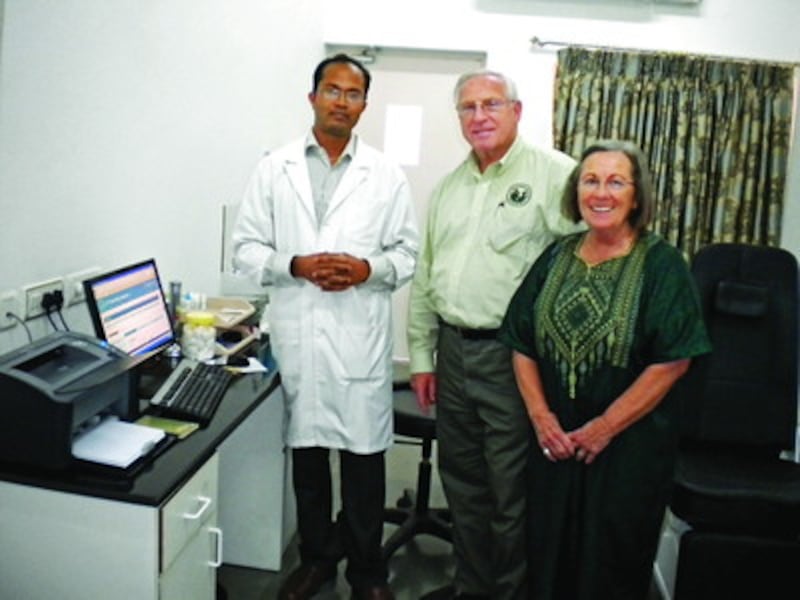 Ike and Gloria Ferguson, specialists for Latter-day Saint Charities, visit with Dr. Vivek Nava Bhara