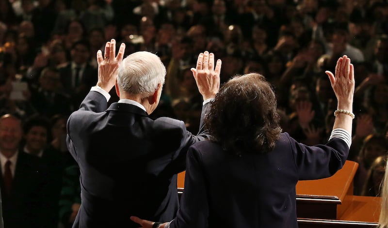 President Russell M. Nelson and his wife, Sister Wendy Nelson, wave to attendees after a devotional in Lima, Peru, on Oct. 20, 2018.