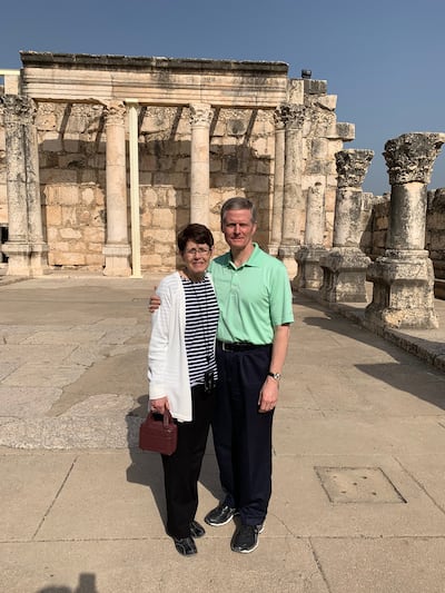 Elder David A. Bednar of the Quorum of the Twelve Apostles and Sister Susan Bednar pose for a photo at the excavated ruins of an ancient Byzantine-era synagogue in Capernaum, Israel, near the Sea of Galilee on Jan. 27, 2019.