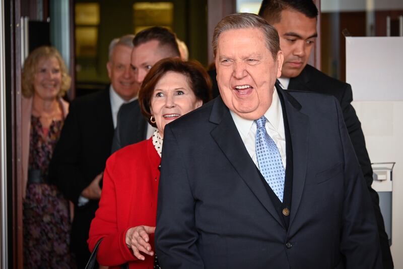Elder Jeffrey R. Holland and Sister Patricia T. Holland, enter the Hannover Germany Stake Center on Nov. 4, 2022