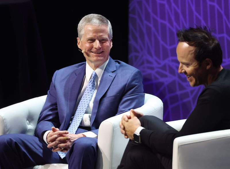 Elder David A. Bednar, of the Quorum of the Twelve Apostles of The Church of Jesus Christ of Latter-day Saints, talks with Qualtrics cofounder and Utah Jazz owner Ryan Smith during a question-and-answer session at the eighth annual Silicon Slopes Summit at the Delta Center in Salt Lake City on Thursday, Sept. 28, 2023.
