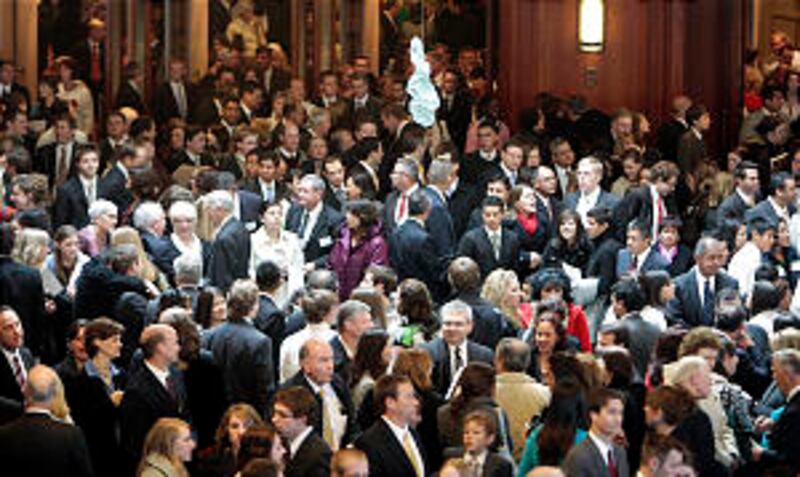 Members from many nations fill a Conference Center foyer after the Sunday morning session of general