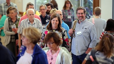 Becky and Gary Swain of Provo wait in line for a class at the Wilkinson Student Center during BYU Education Week in Provo on Tuesday, Aug. 21, 2018.