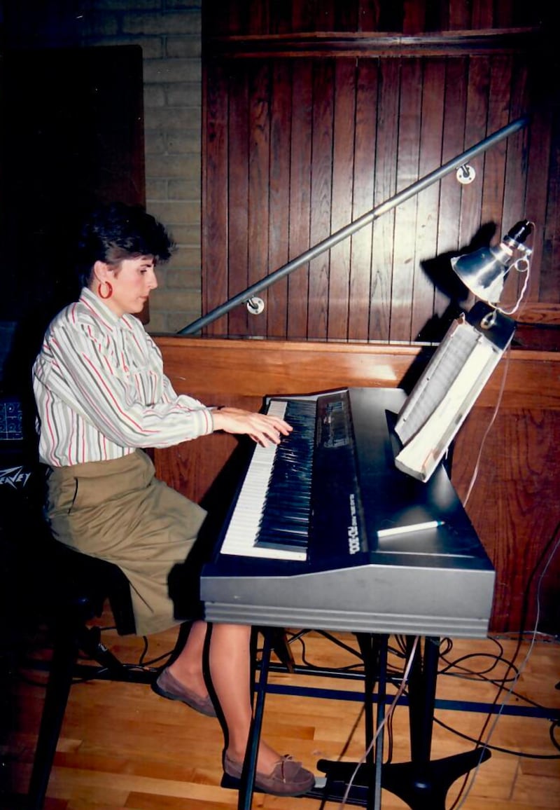 Composer Cathy Tibbitts plays the keyboard in Southern California in 1991.
